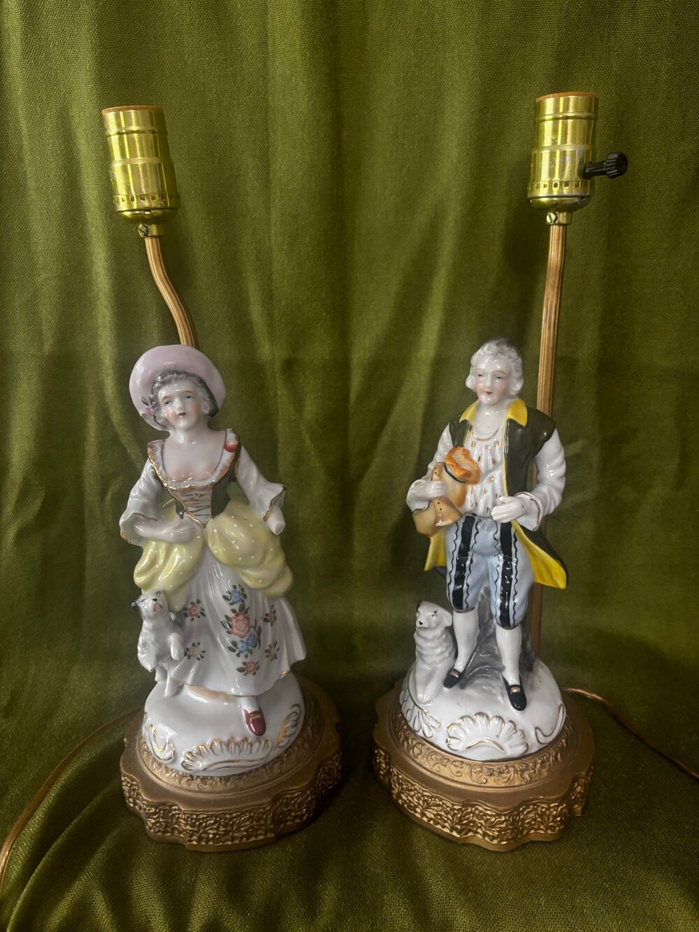 Pair of Victorian-style Colonial couple resin figural table lamps with dogs